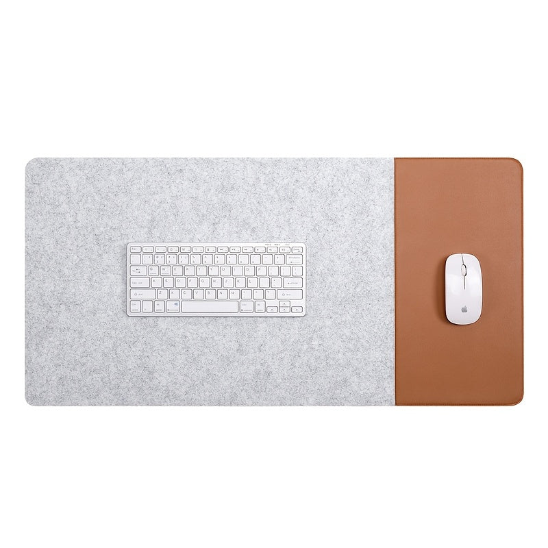 Large gaming mouse pad with anti-slip felt and faux leather, suitable for e-sports, writing, and office use. Includes wrist support and keyboard pad.