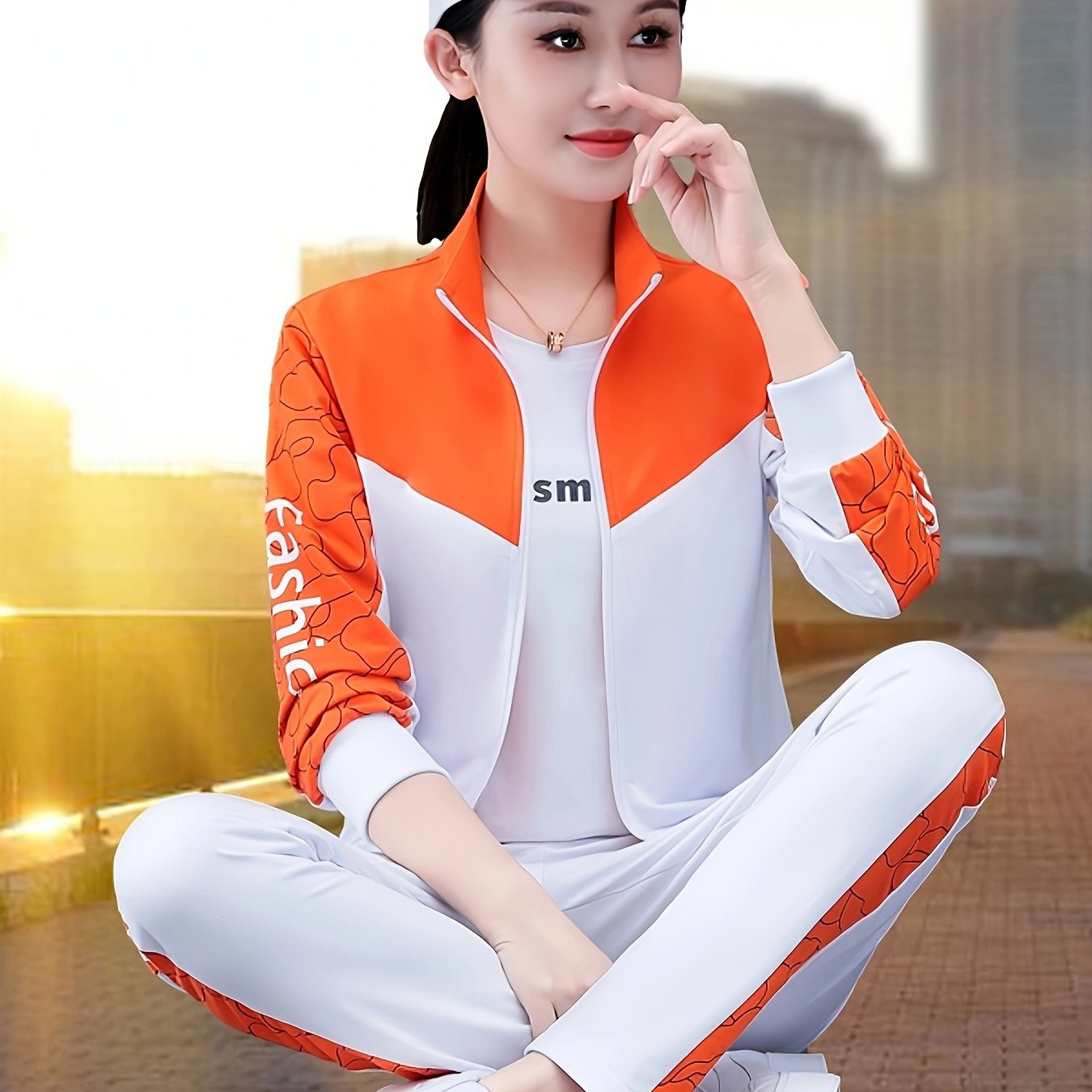 Women's two-piece cardigan jacket sports suit for spring and autumn with long sleeve trousers for casual outdoor wear.