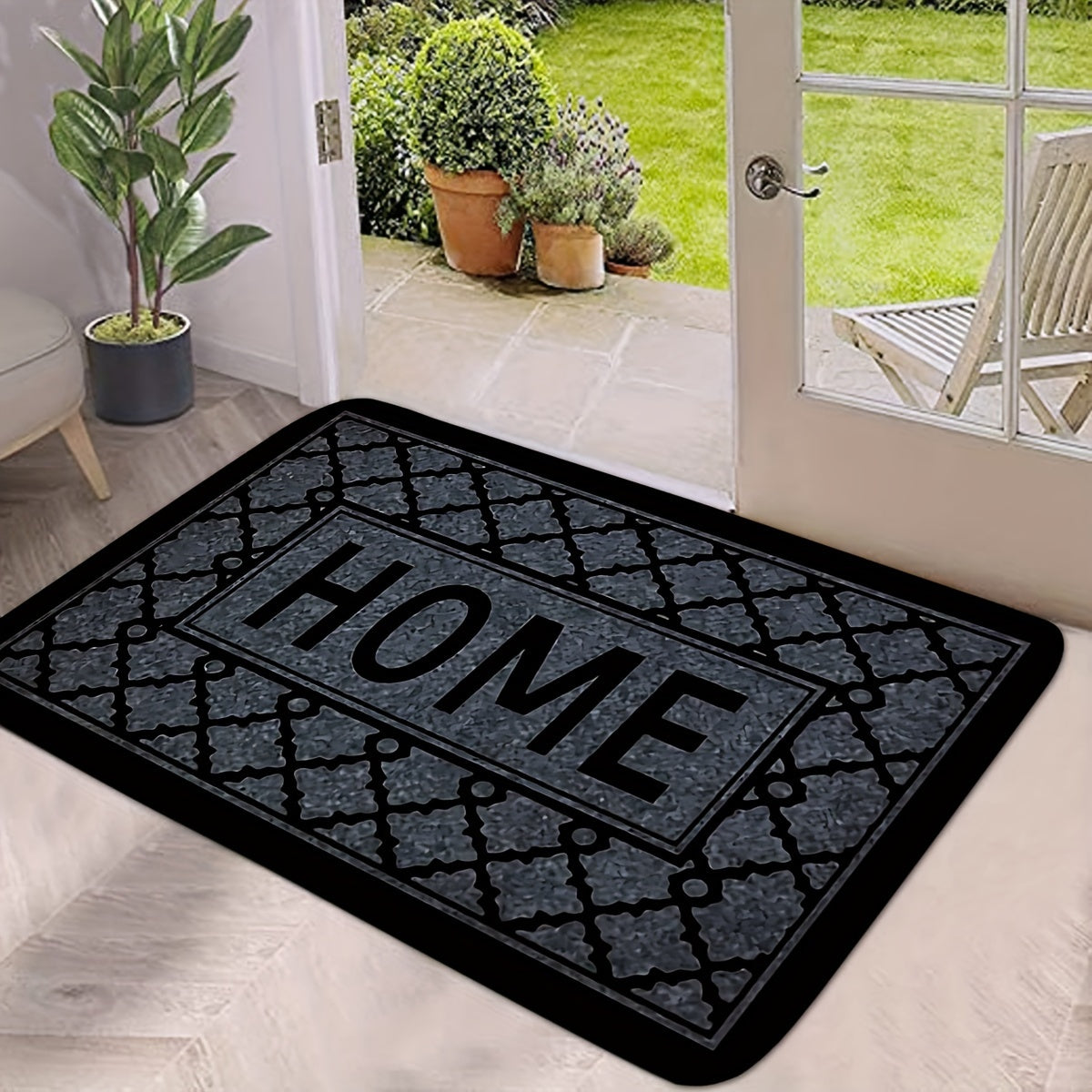 This kitchen flooring mat features a striking black foam design with irregular stripes and the word "HOME" pattern. Made of soft, thick flannel material, this non-slip mat is constructed from 1.2 foam sponge, making it ideal for bathroom and indoor