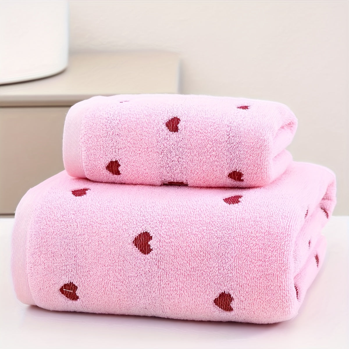 100% Cotton Towel Set with Heart Pattern, 2 pieces. Includes 1 hand towel (34x75cm) and 1 bath towel (70x140cm). Soft, absorbent, unscented. Great for couples, home use, and Valentine's Day