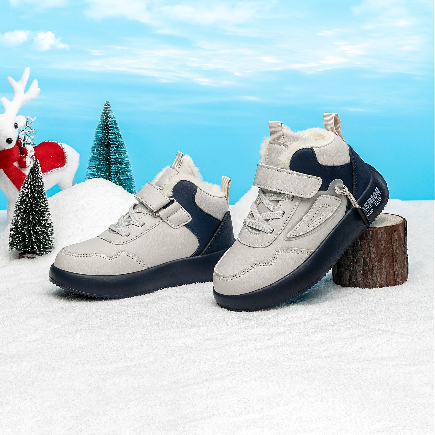 Boys' winter snow boots in navy blue and gray with plush lining, non-slip waterproof high tops, hook-and-loop closure. Suitable for outdoor activities. Made with microfiber upper.