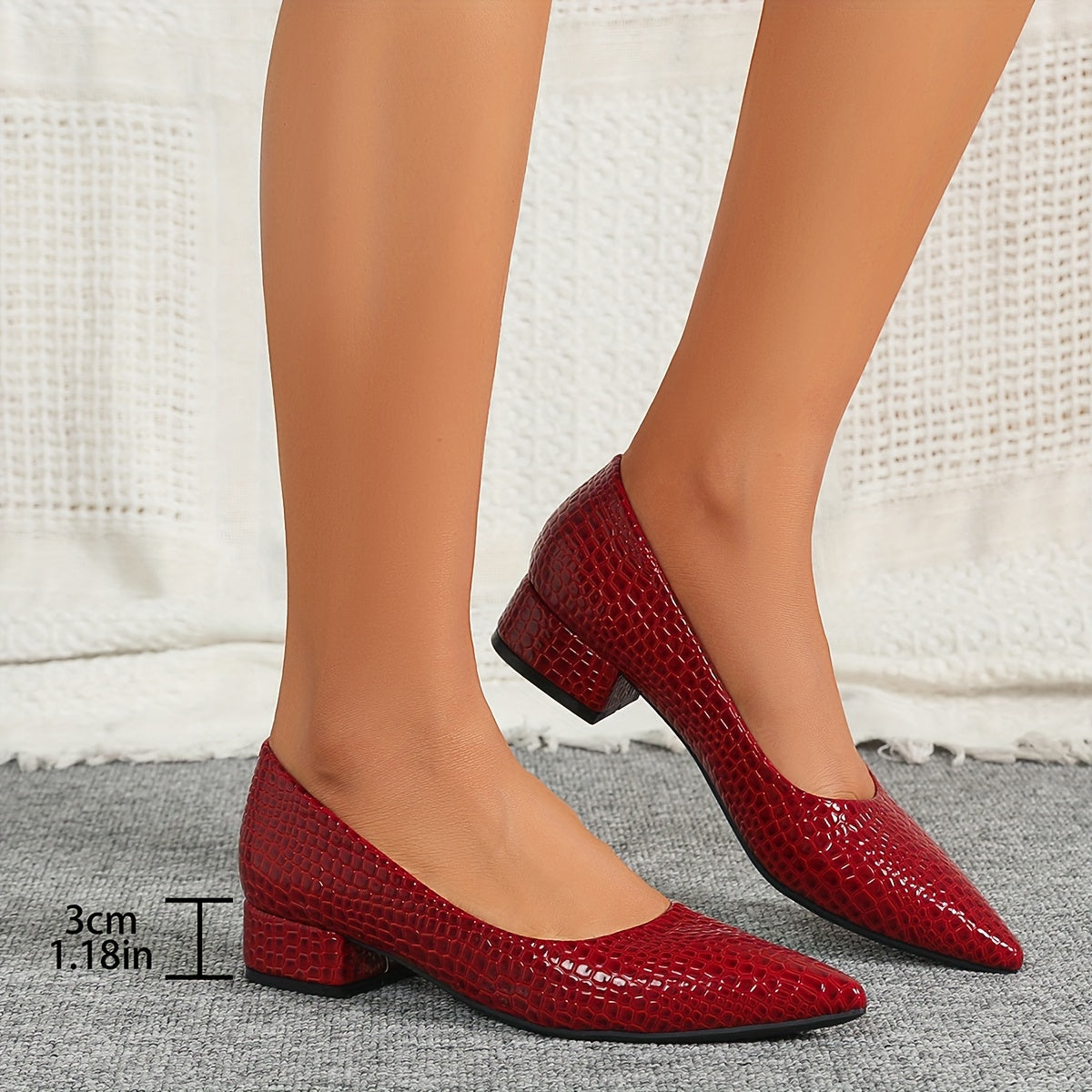 Stylish red snakeskin pattern pumps with pointed toe, low heel, and lightweight PU cover - perfect for weddings and parties. versatile and comfortable design for ladies.