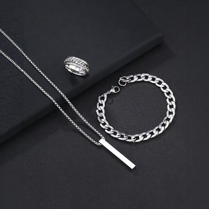 Stylish 3-piece men's jewelry set: black pendant necklace, bracelet, and ring made of durable stainless steel. Perfect Valentine's Day gift.