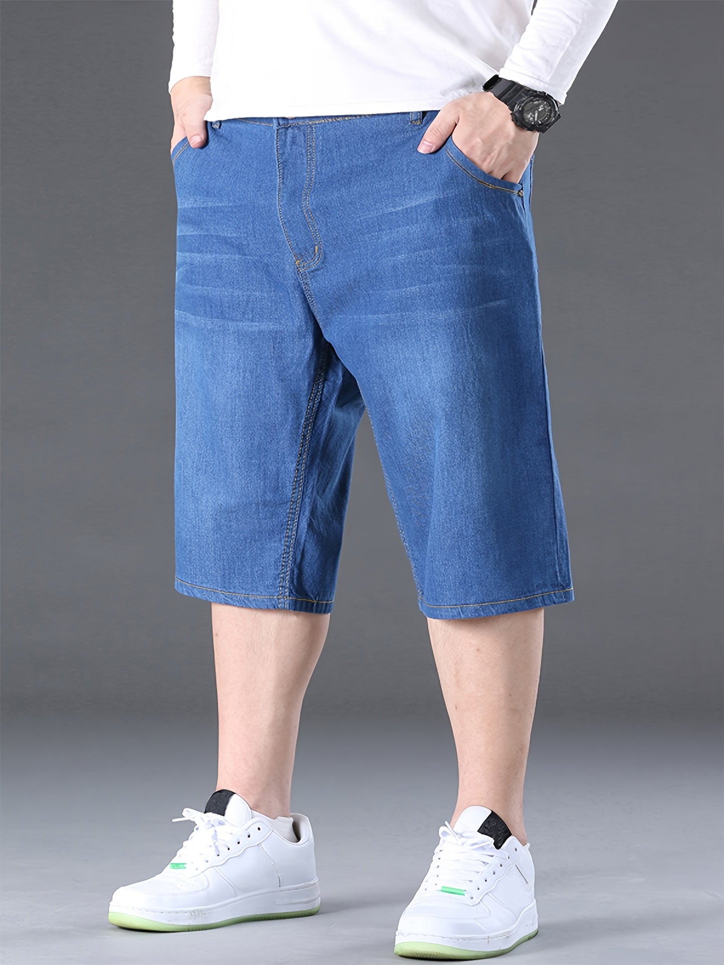 Stylish summer denim shorts for plus-size men in blue.