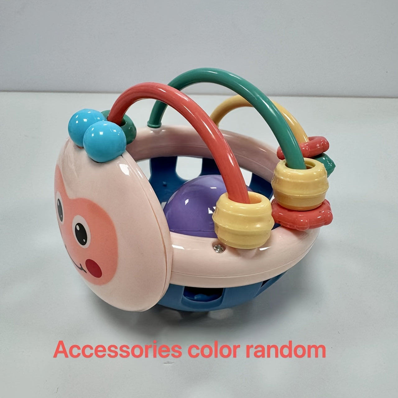 Toys like rattles, gripping toys, teething toys, and handheld balls.