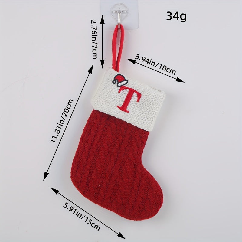 Knitted letter Christmas socks for home tree ornaments; red socks in gift bag for festive attire.