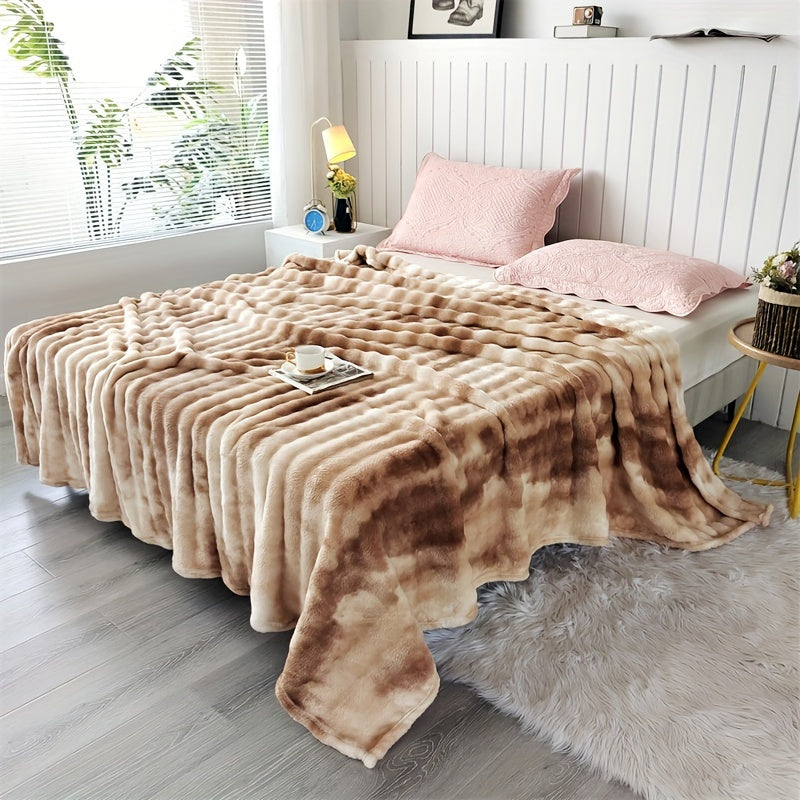 Modern soft faux rabbit fur bed blanket with a tie-dye plush flannel design, featuring a thick dual layer for ultimate coziness in all seasons. Made of machine washable polyester in a rainbow moire pattern, perfect for the sofa, living room, or bed.