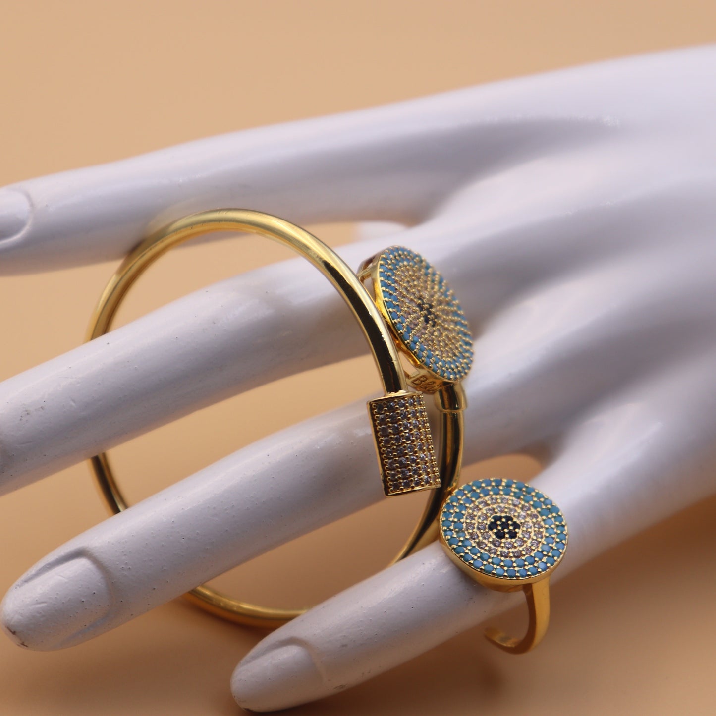 24K gold plated bangle with ring featuring elegant turquoise inlay, ideal for special occasions and festivities. Crafted from high-quality alloy for long-lasting wear.