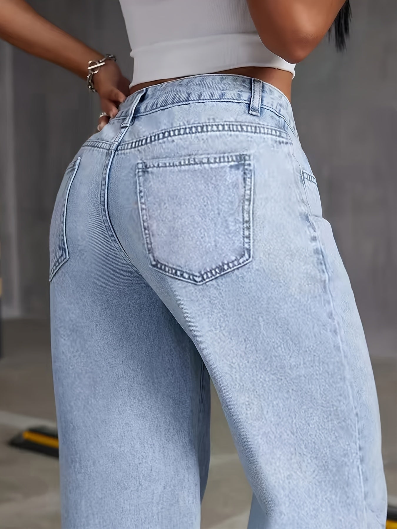 Women's slim straight jeans in snowflake wash, with high stretch and comfortable fit for all seasons.