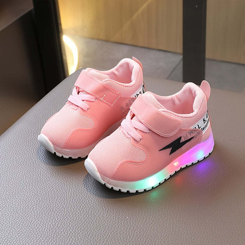 LED light-up sneakers for kids with breathable fabric and non-slip rubber sole, ideal for all seasons.