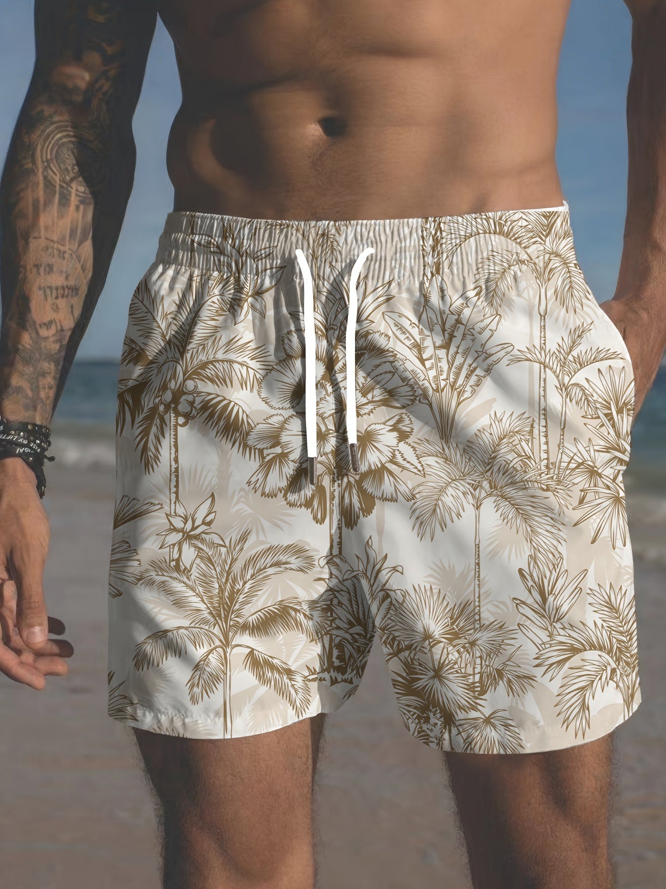 Men's plus-size Hawaiian beach shorts with palm trees print and pockets, ideal for casual swimwear.