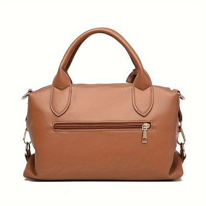 Stylish shoulder bag with removable strap and zip closure, perfect for everyday use.