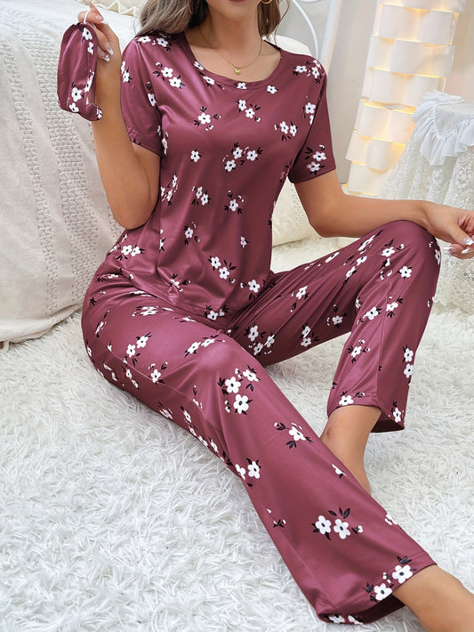 Women's sleepwear set with floral print loose pajamas, short-sleeve tee top, and pants.