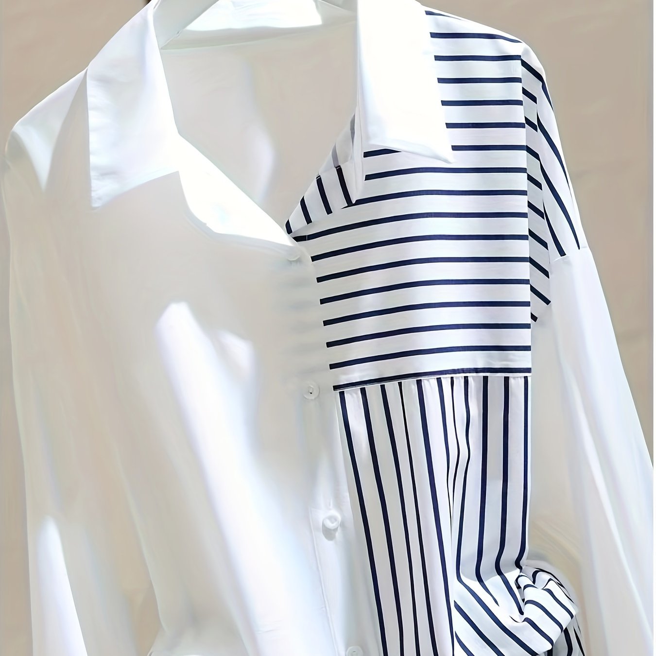 White loose-fitting shirt for women with striped patchwork, perfect for spring and autumn, in a unique casual style.