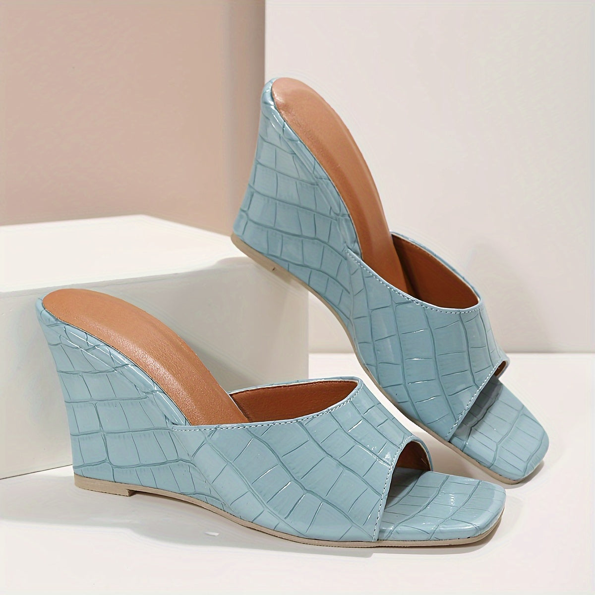 Women's slip-on wedge sandals with square toe and solid color high heels, perfect for a fashionable night out.