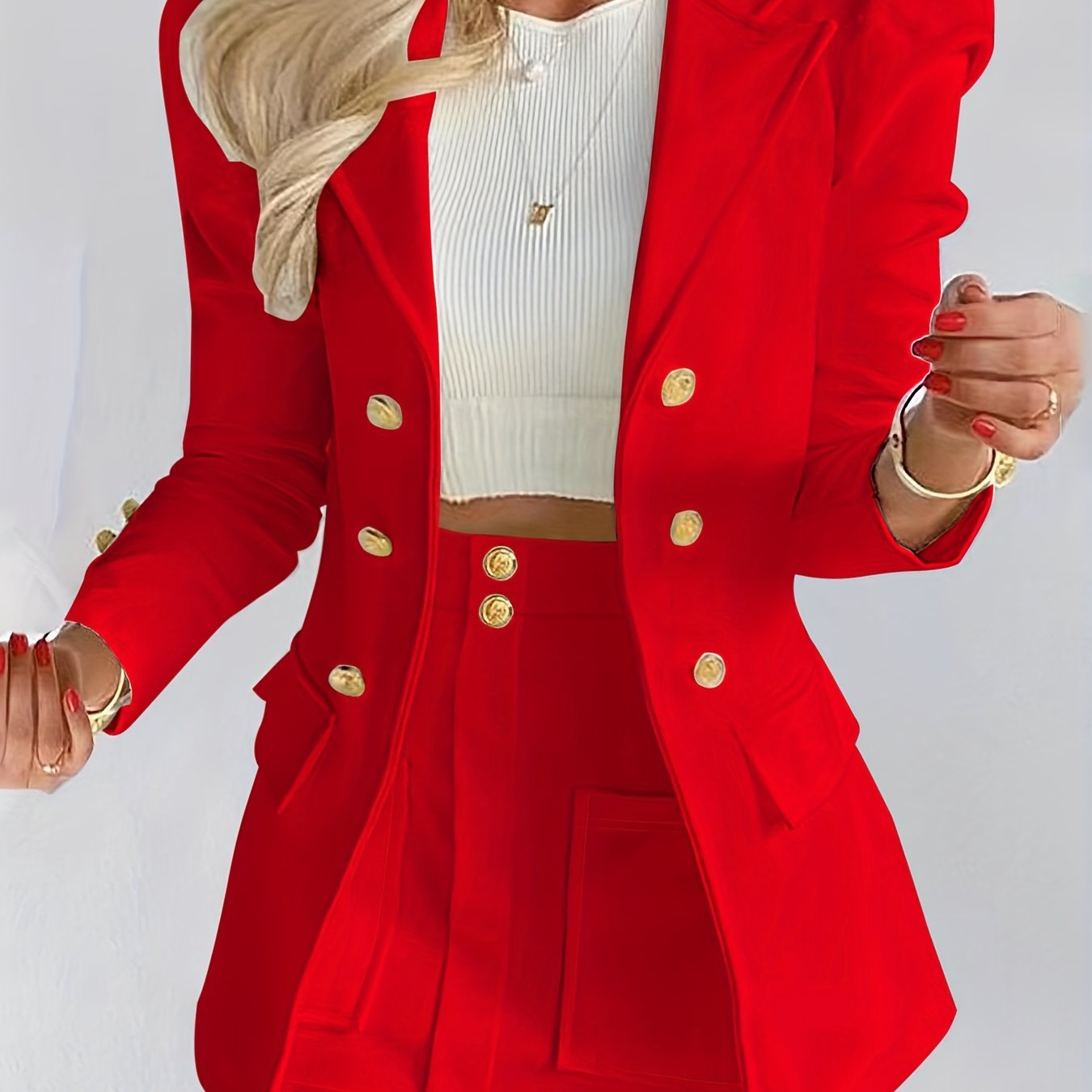 Elegant solid long sleeve blazer and mini skirt set for women.