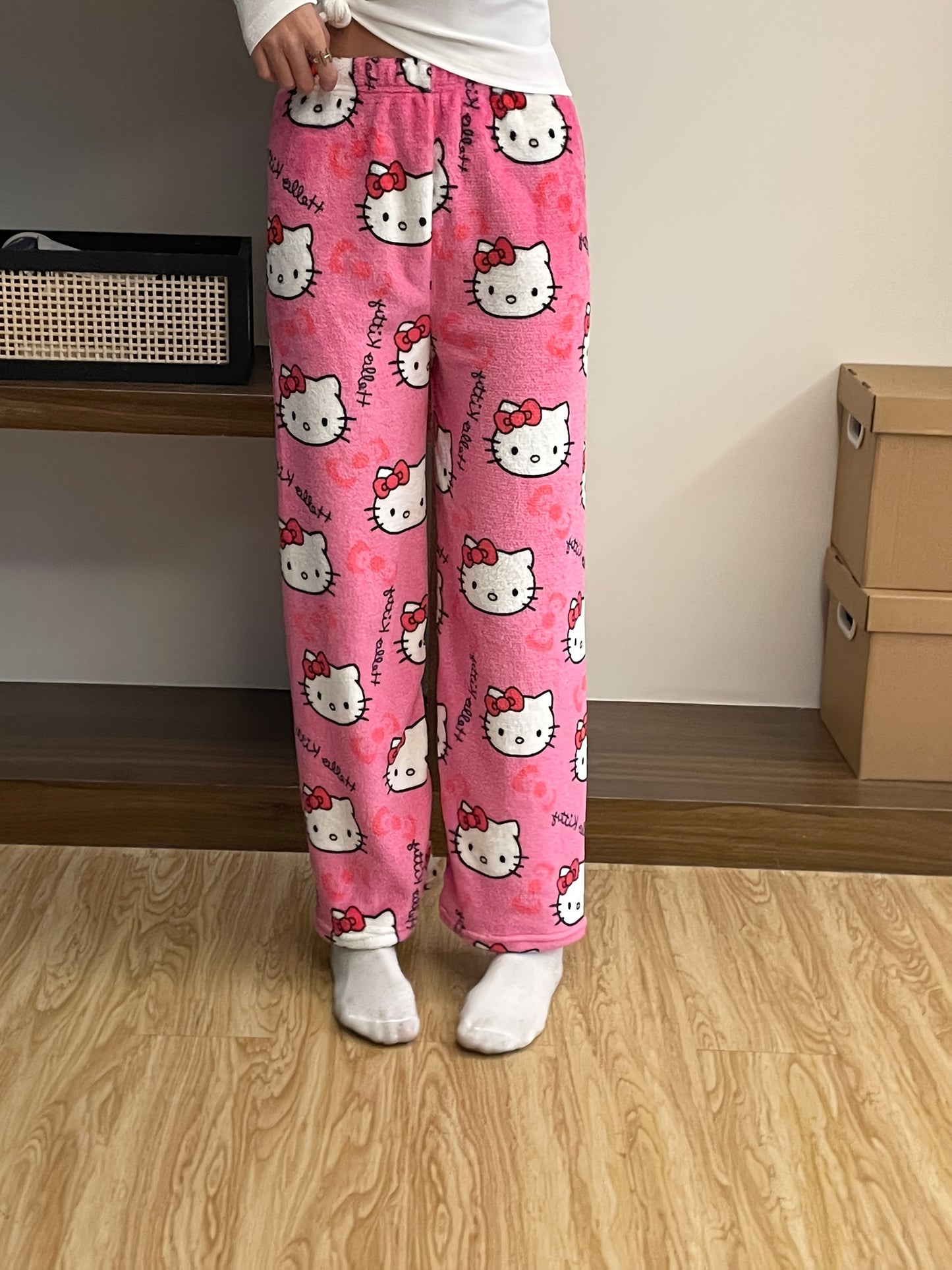 Sanrio Hello Kitty cozy flannel pajamas for women, officially licensed and perfect for relaxing and sleepwear.