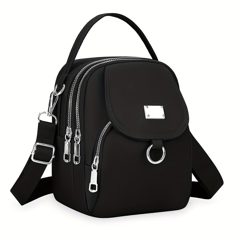 Black messenger bag for women, made of oxford cloth with zipper closure and polyester lining, perfect for daily use.