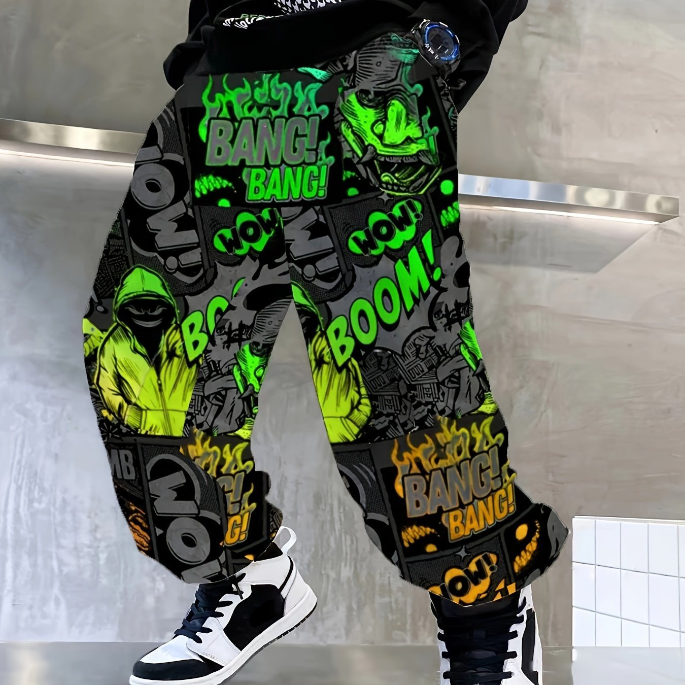 Comfy boys joggers with graffiti and ink splashes, elastic waist.