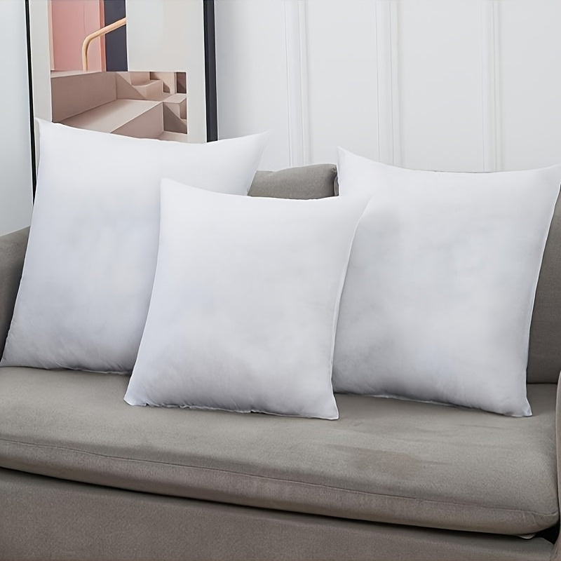 4-piece soft and fluffy white pillow core set - ideal for indoor/outdoor use in terraces, sofas, bedrooms, dormitories, and family living rooms. Made of polyester material and available in three sizes.