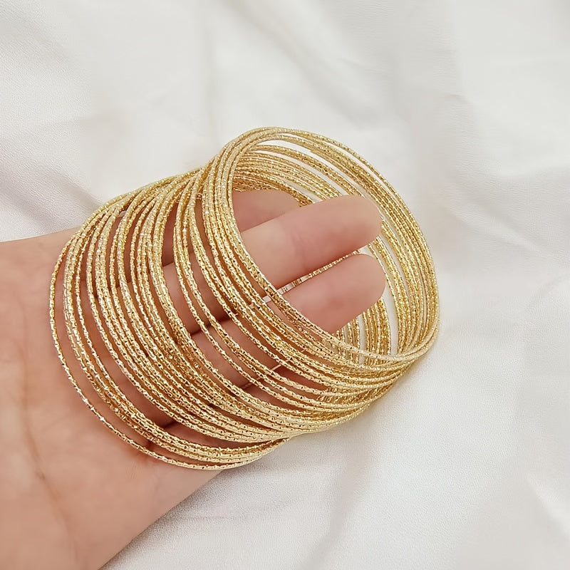 A collection of 30/50 fashionable golden bracelets for women, designed to resemble stars in the sky. These bracelets are perfect for daily wear or make a great gift for vacation.