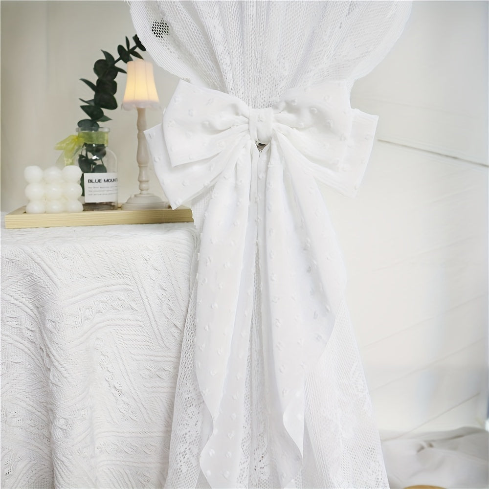 Add a touch of style to your bedroom, living room, and kitchen with these chic bow holdbacks for easy curtain control - the perfect accessory for stylish home decoration.