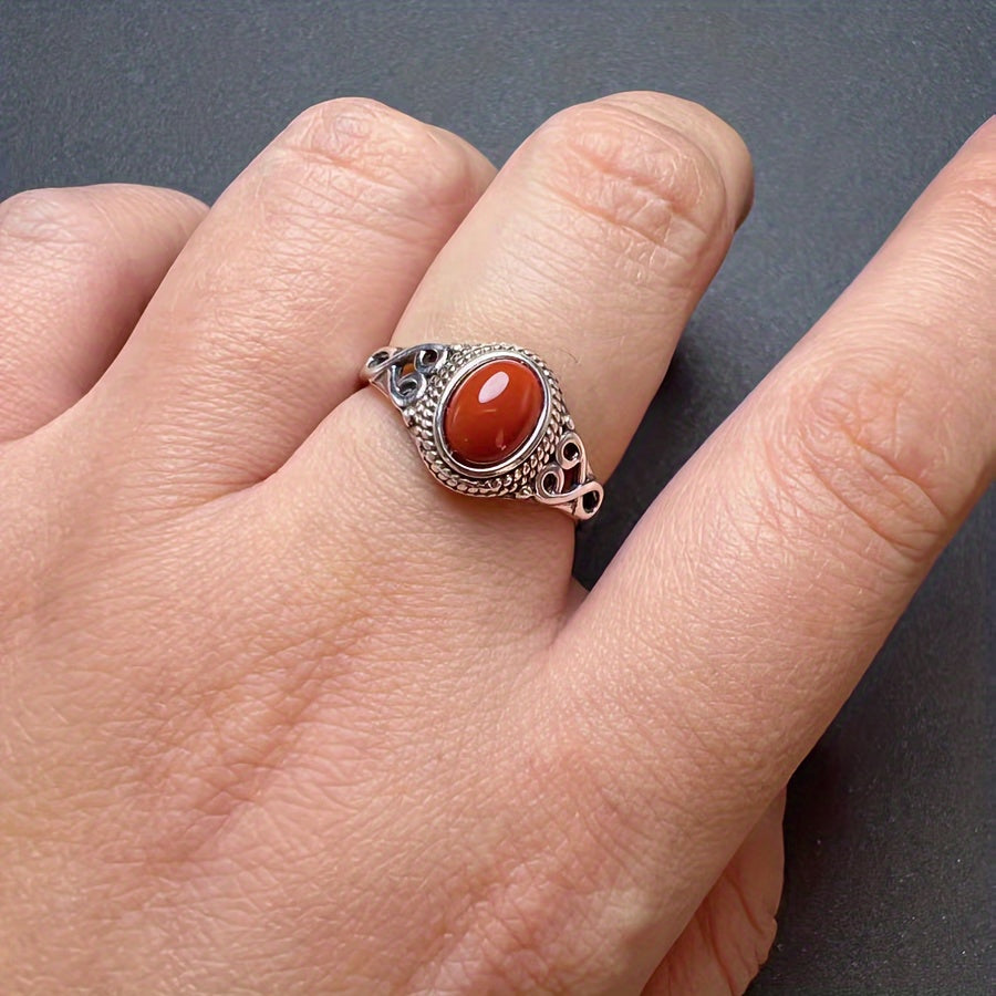 A stylish women's ring with a retro ethnic design, featuring a 925 Silvery inlay and a synthetic red coral stone. Ideal for both everyday wear and special occasions, making it a great gift for Christmas or Valentine's Day.