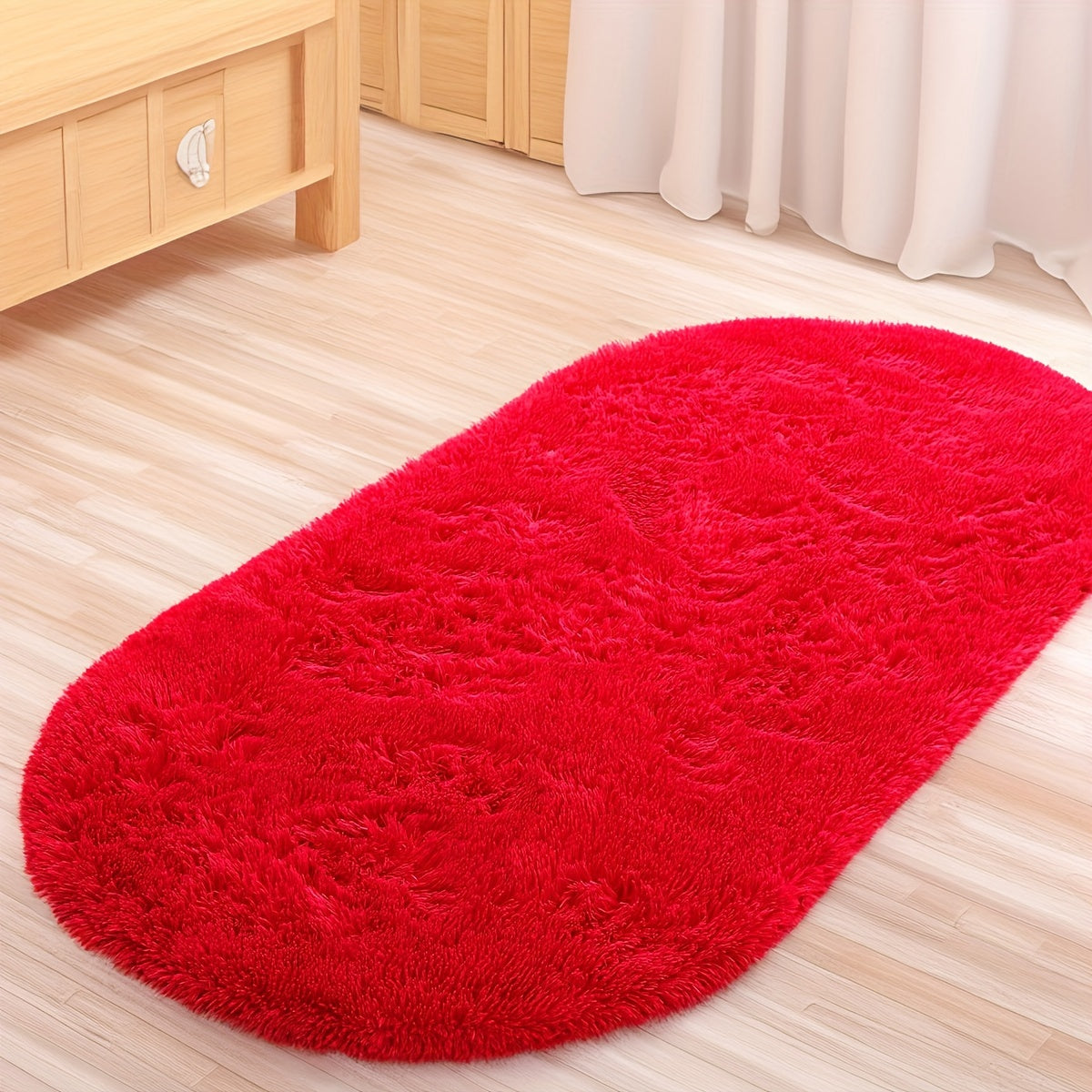 Soft and fluffy oval shaggy area rug, perfect for bedroom or living room. Made with skin-friendly thickened sponge and tufted polyester material. Durable and easy to maintain. Adds decorative touch to indoor spaces such as sofa, bedside, playroom, or