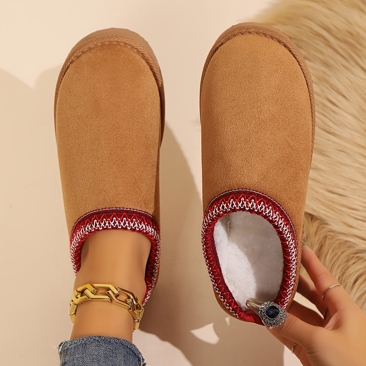 Warm and cozy women's winter slippers with plush lining and anti-slip sole.