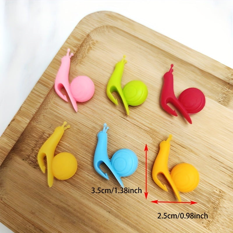 Set of 6 durable silicone snail wine glass labels for tea cups and bags to enhance your drinking experience. Easy to use.