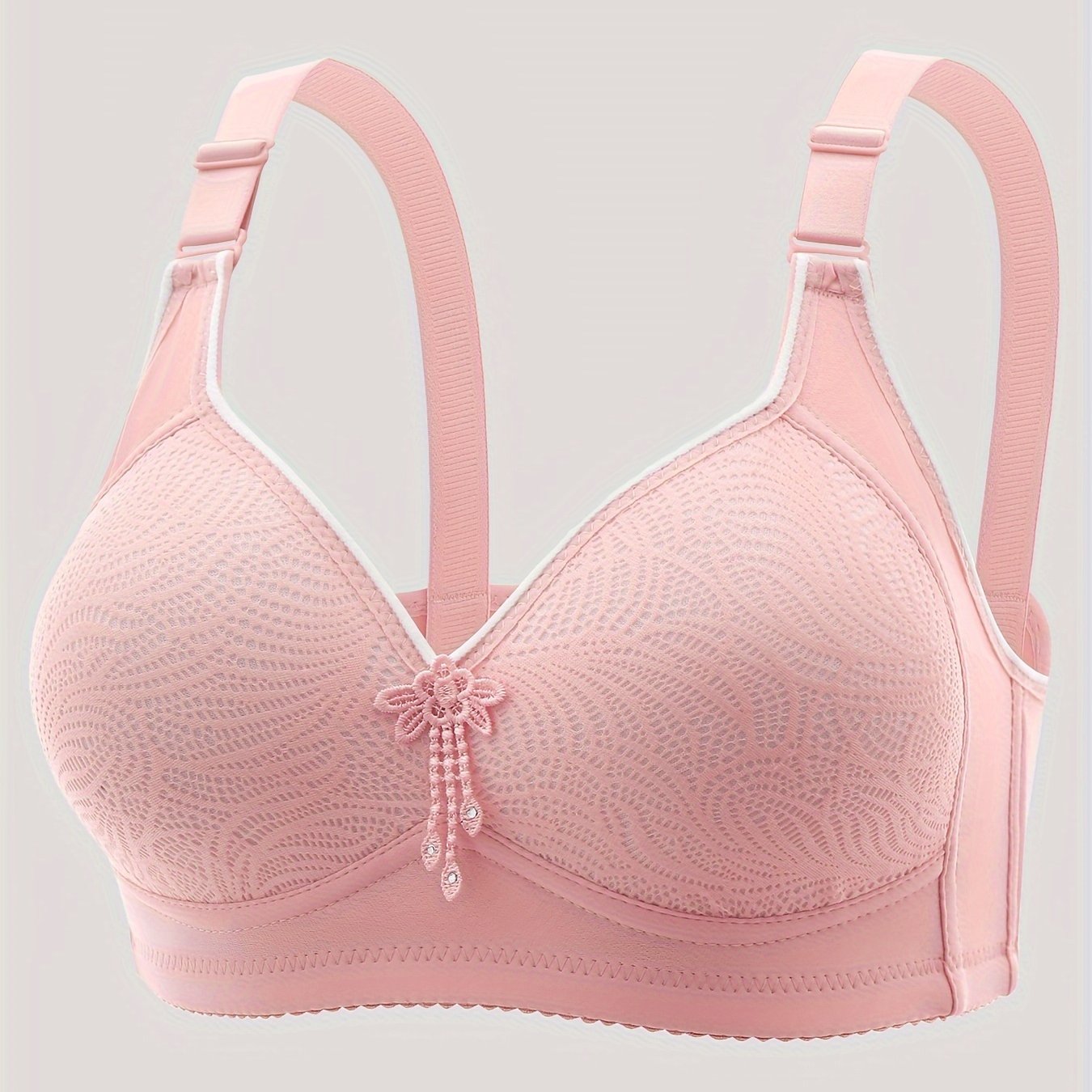 Printed, mature-style full-coverage bra with adjustable, wireless design and secure closure.