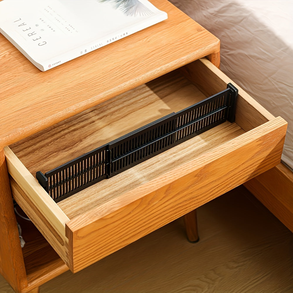 8 adjustable drawer dividers for organizing underwear and socks. Made of durable plastic with expandable grids.