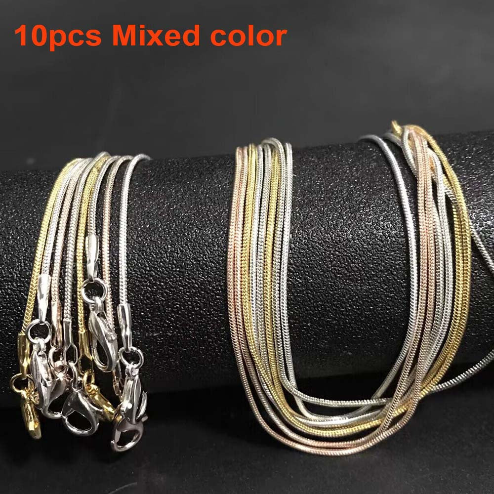 10 pieces of snake chains in Rose Gold, Gold, and Rhodium plating, ranging from 16 to 30 inches in length. Each chain comes with a lobster clasp and is perfect for creating custom jewelry pieces. Great for DIY crafting and jewelry making supplies.