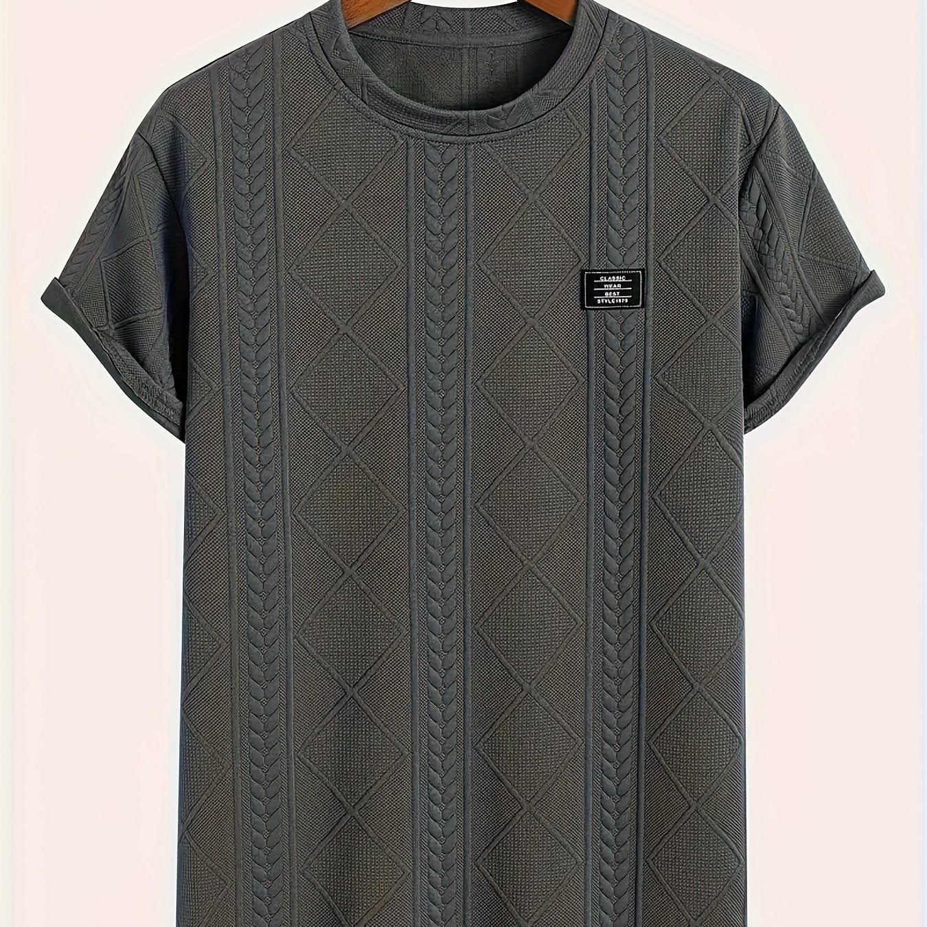 Men's short sleeve t-shirt with embossed pattern, made of 100% polyester knit fabric with slight stretch, crew neck, regular fit.