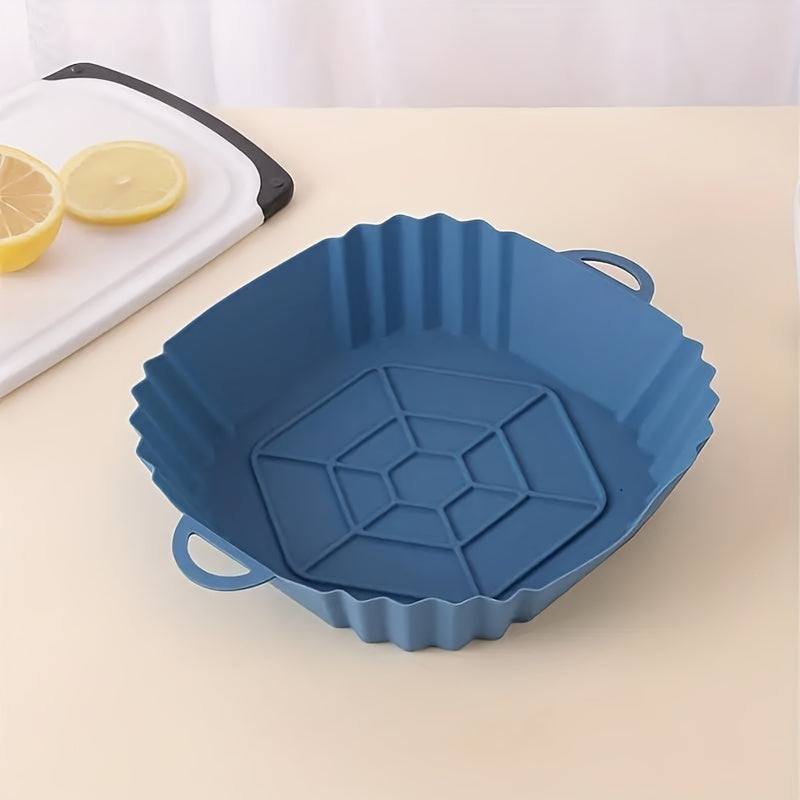 Get a square-shaped 1-piece reusable silicone air fryer baking pan that is non-stick and heat resistant up to 240°C. It comes with textured grip handles for easy handling and is perfect for making crispy chicken and more. An essential kitchen accessory