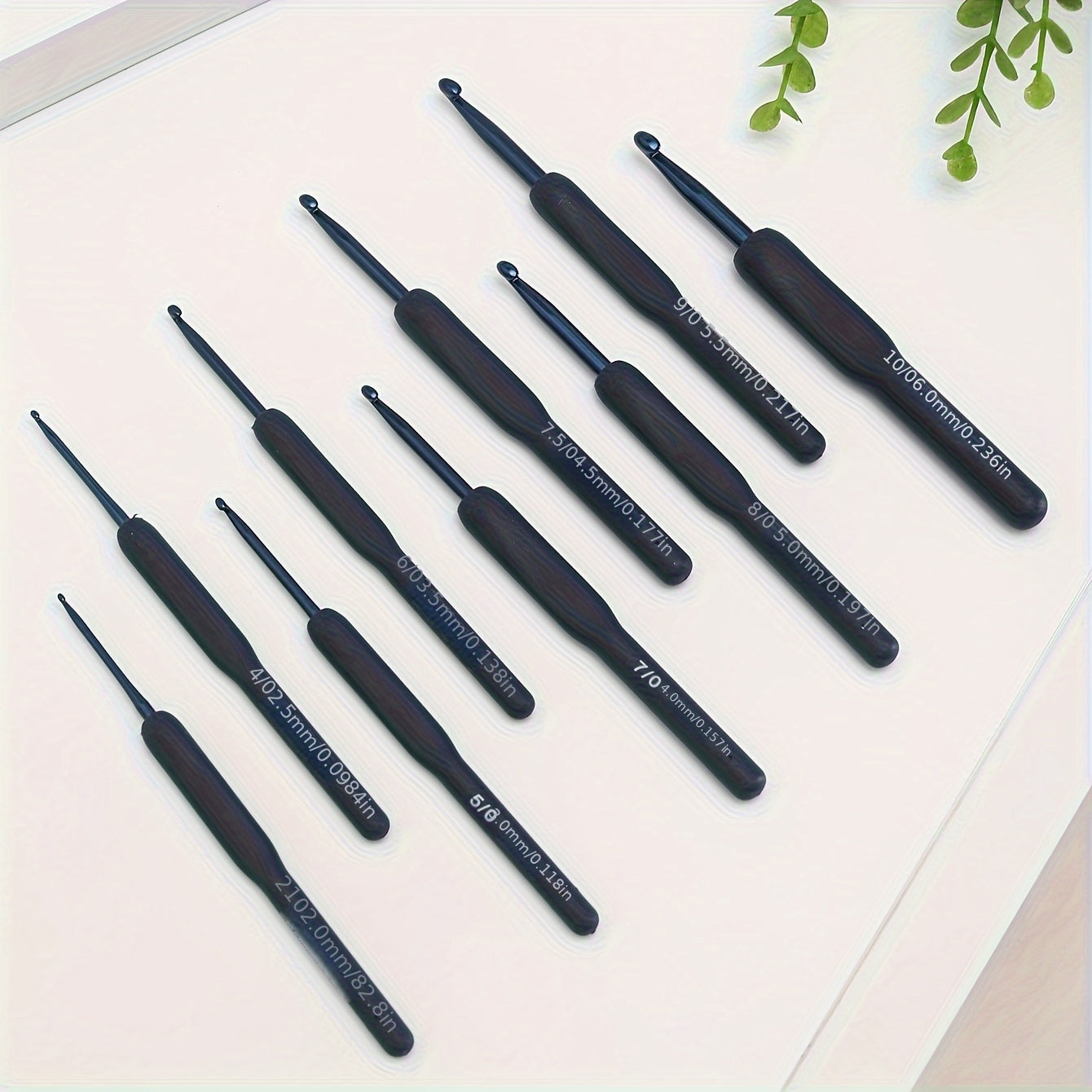 9-piece ComfortGrip Crochet Hooks Set with Ergonomic Dark Blue Needles, ideal for Arthritic Hands and Beginners.