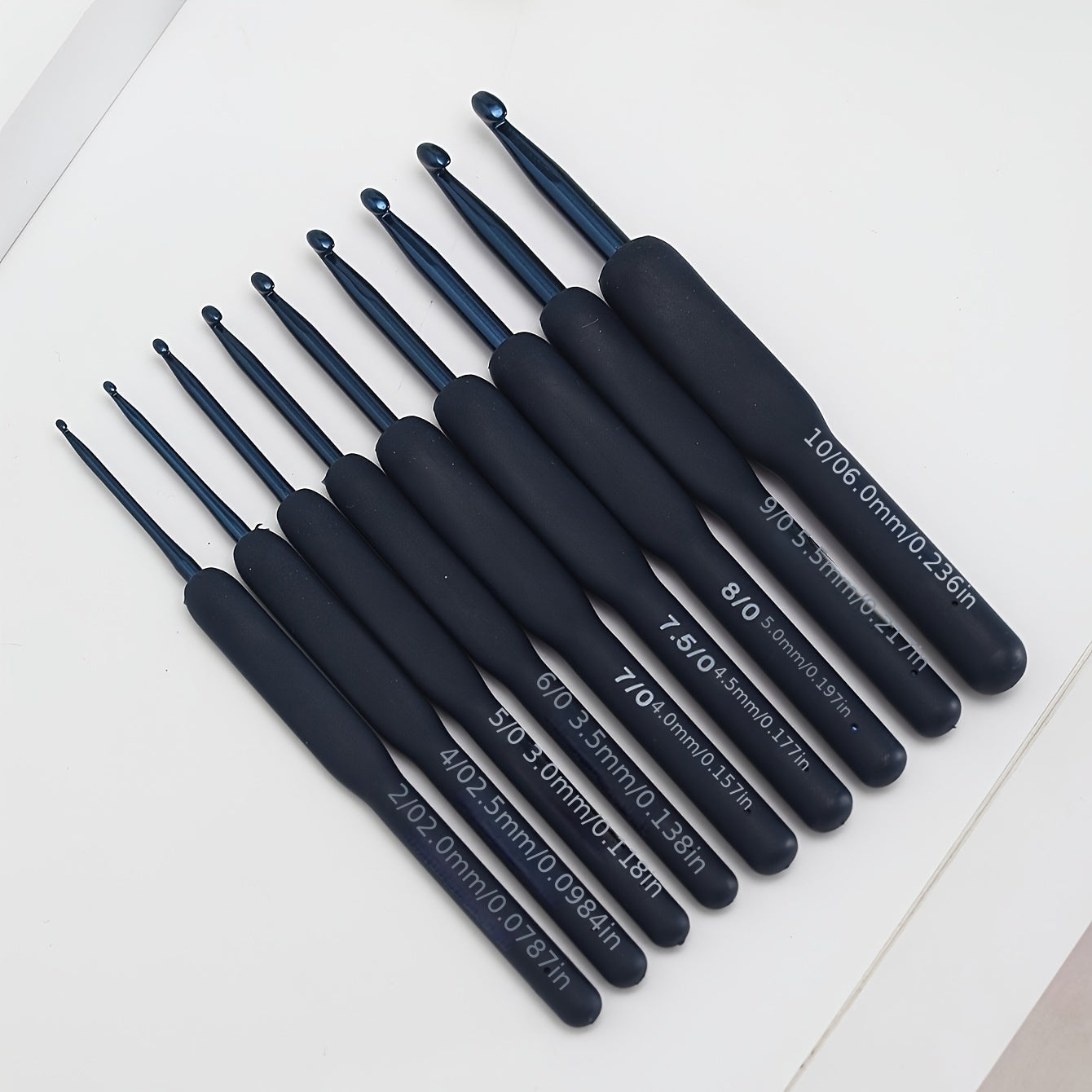 9-piece ComfortGrip Crochet Hooks Set with Ergonomic Dark Blue Needles, ideal for Arthritic Hands and Beginners.