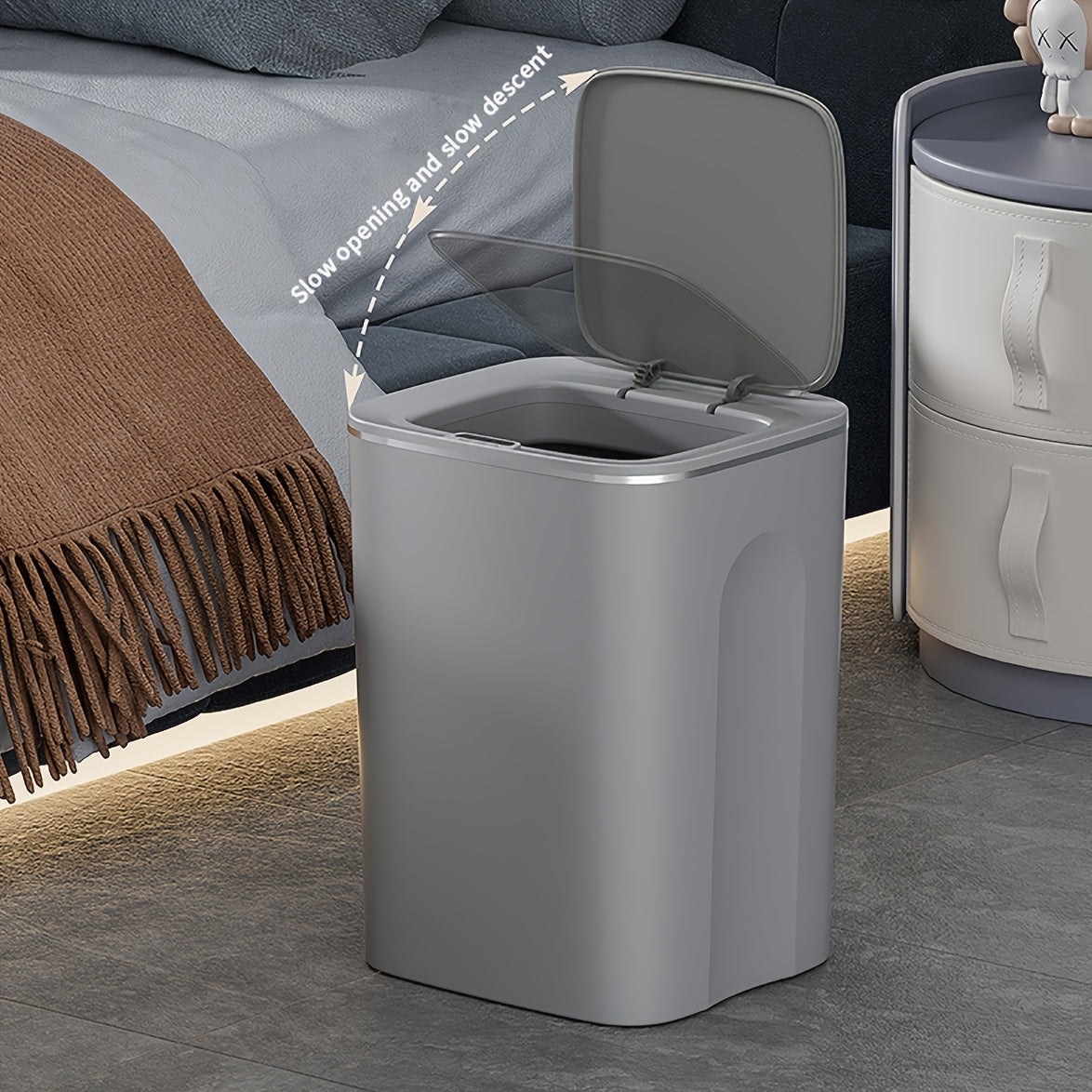 The Smart Touchless Trash Can features automatic open and close functions, operates quietly, and has a waterproof design ideal for home use.