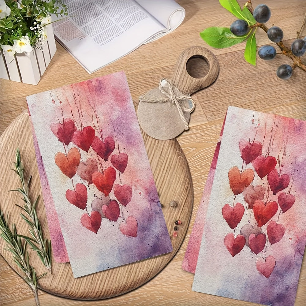 2 pieces of ultra soft kitchen towels featuring a Valentine's Day heart design. These highly absorbent and machine washable dish hand towels showcase romantic pastel hearts with balloons. Each towel measures 40.64x60.96 cm, making them perfect for