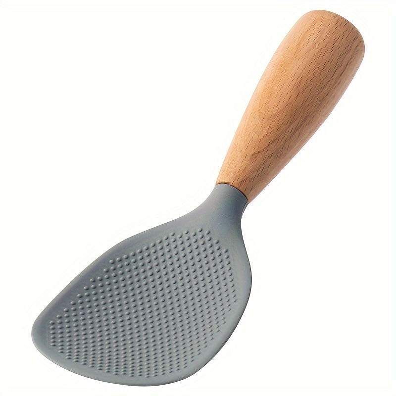 Heat resistant silicone spoon with wooden handle for non-slip rice cooker. Practical kitchen tool for home, school, and dorm.