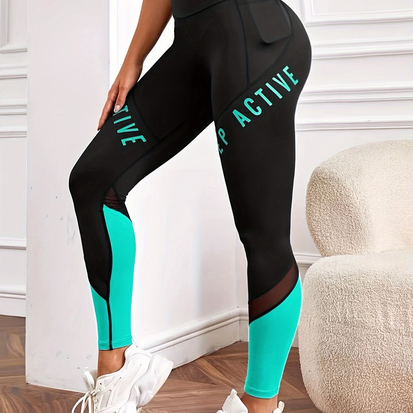 High waisted yoga leggings with pockets and color-block letter print for women's casual sports wear.