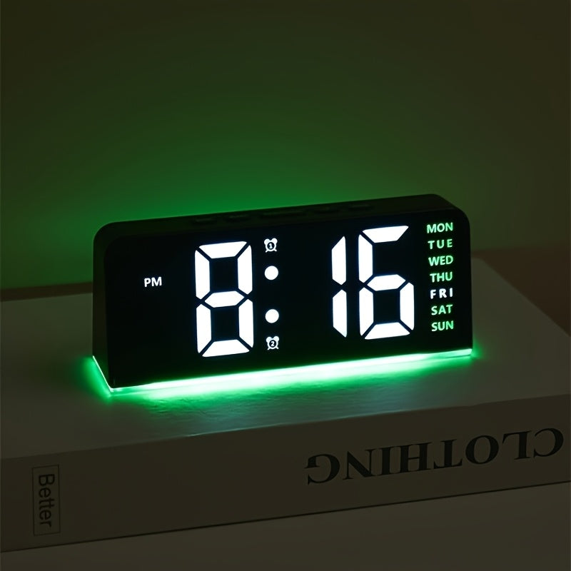 Digital LED Alarm Clock with USB power, sleek black plastic frame, dual time display, modern design for bedroom decor. Battery-operated (AAA not included).