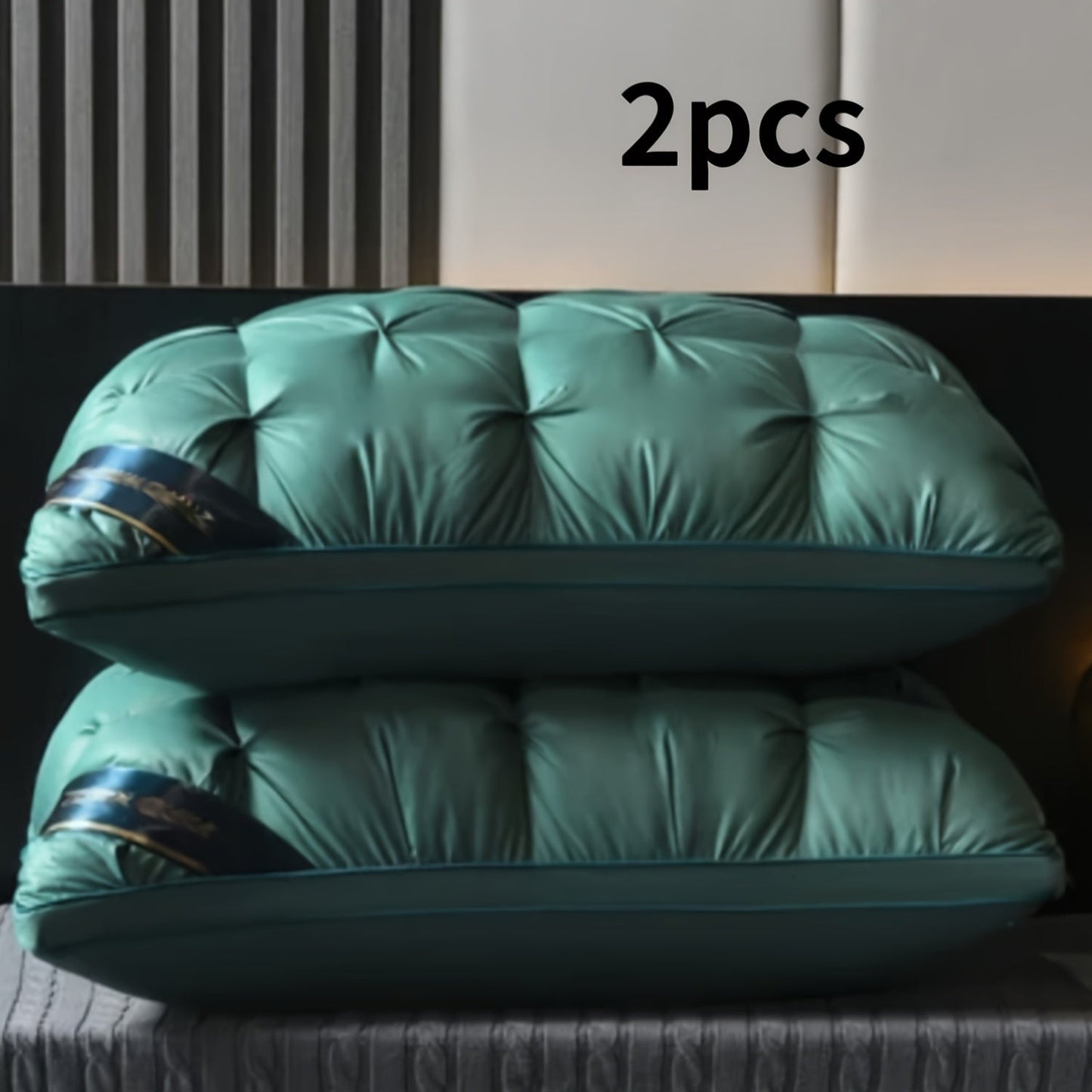 Two high-quality microfiber pillows for luxurious hotels, designed with a compressible flower-crafted neck support and a soft polyester cover. These pillows are dry clean only, made with woven fabric and weigh 95 grams each. They offer a moderate