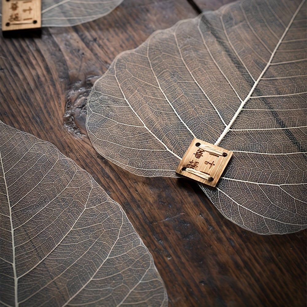 Tea lovers rejoice with the Bodhi Leaf-Shaped Tea Strainer! This beautiful Chinese-style strainer is crafted from natural materials and is heat-resistant. Not only does it serve as a multifunctional tea filter, but it can also double as a convenient