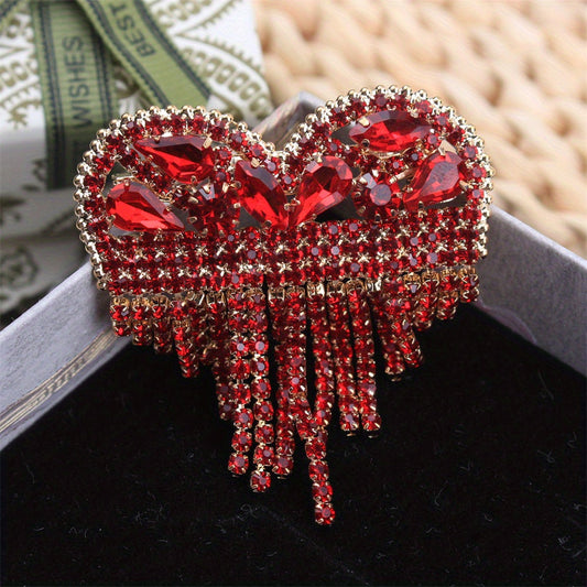 Luxurious Heart-Shaped Rhinestone Brooch Pin with Tassel, featuring an Elegant and Unique Irregular Shape. This Novelty Simulation Modeling accessory is perfect for ladies who want to make a fashion statement. Ideal for parties and also makes a great