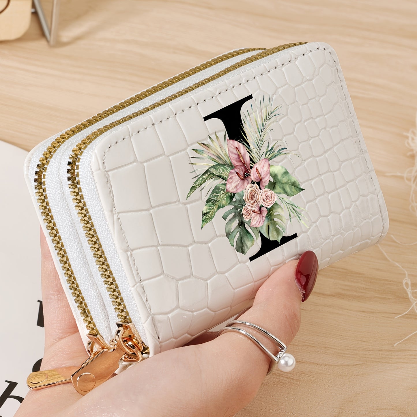 Women's credit card wallet with elegant floral letter print in black & white. Features large capacity, dual zipper, crocodile texture PU, lightweight design with nylon lining for everyday