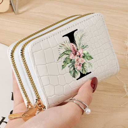 Women's credit card wallet with elegant floral letter print in black & white. Features large capacity, dual zipper, crocodile texture PU, lightweight design with nylon lining for everyday