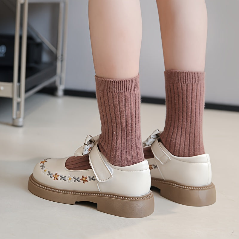 Girls' Mary Jane shoes for Fall 2024, featuring an elegant princess style with floral embroidery and bow detail. Non-slip rubber sole, hook-and-loop strap closure for school, parties, or