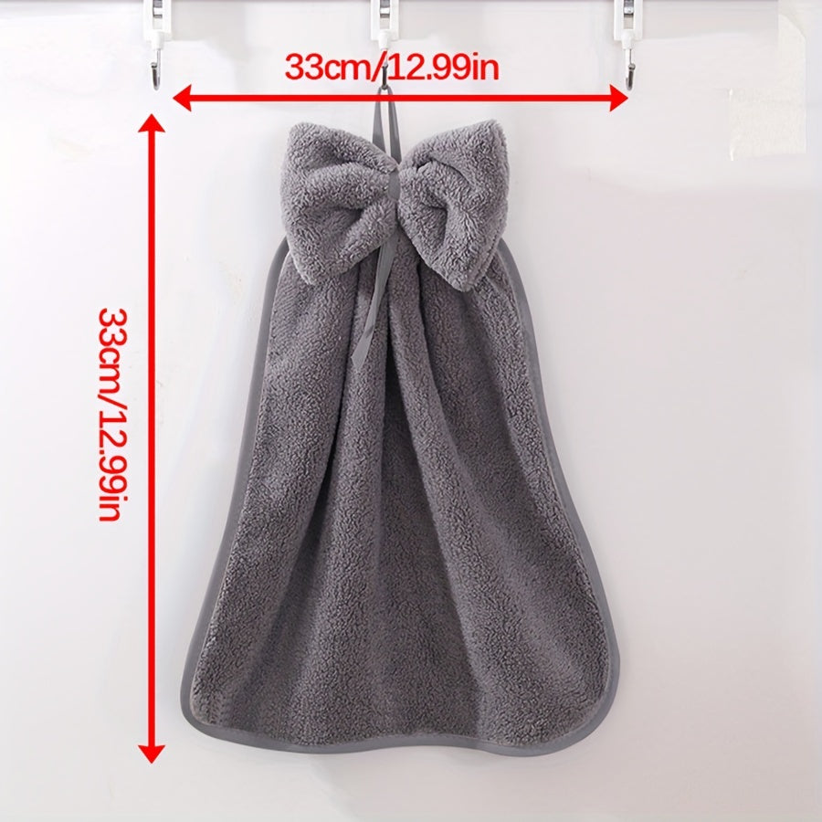 3-piece kitchen towel set with bowknot skirt pattern. Absorbent and quick-drying for household cleaning. Ideal kitchen essentials.