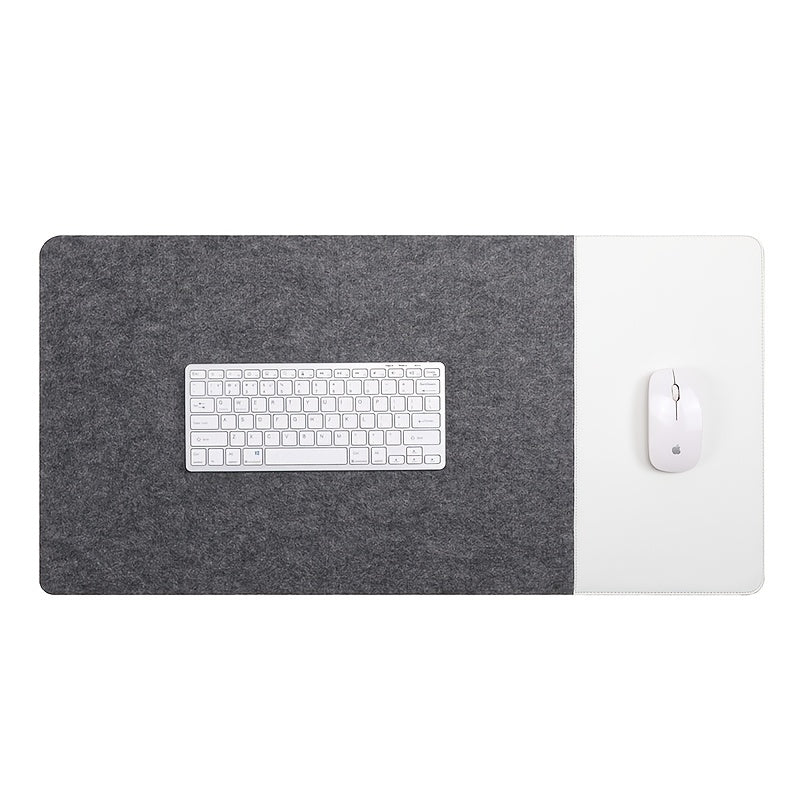 Large gaming mouse pad with anti-slip felt and faux leather, suitable for e-sports, writing, and office use. Includes wrist support and keyboard pad.